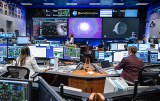 Artemis II flight control team at their consoles in NASA Mission Control