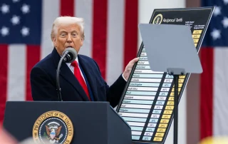 President Trump showing the reciprocal tariffs chart in the White House Rose Garden on 2 April 2025